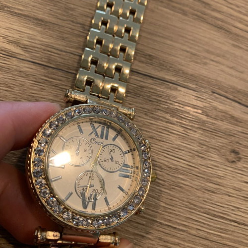 Golden wristwatch, women's
