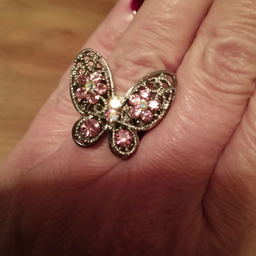 Butterfly adjustable ring like new