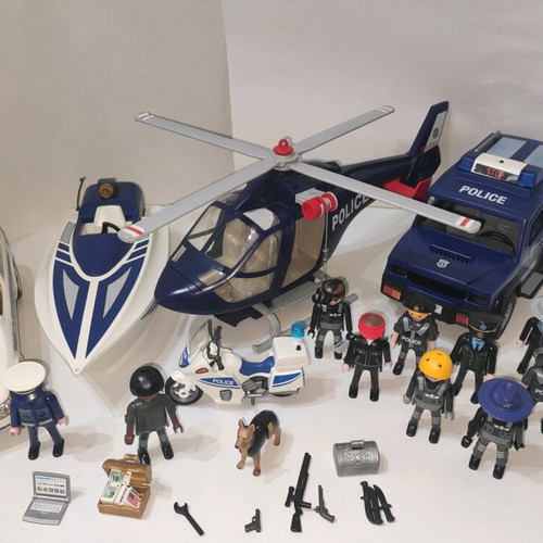 Playmobil police set with helicopter, 2 cars, motorcycle, boat and 11 figures like new