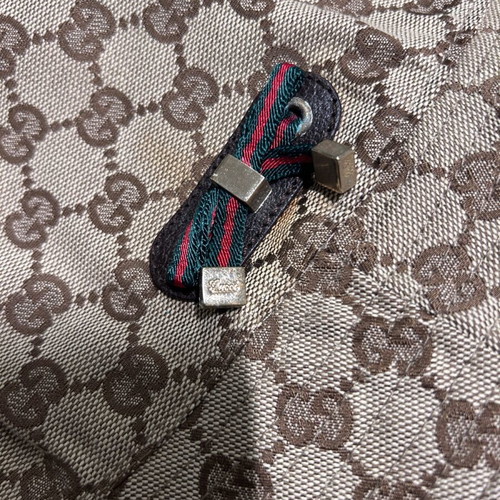Gucci hat like new with metal details and brown lining
