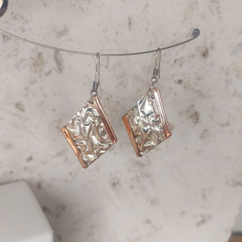 Silver plating dangling earrings like new, gold and silver colors