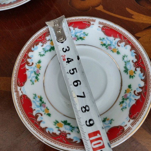 Set of 4 cups with saucers like new