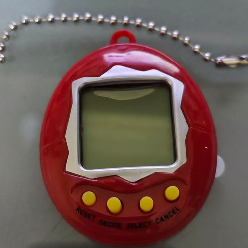 Retro digital virtual pet with chain, like new