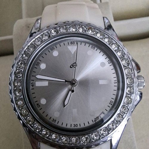 Women's silver-tone watch with crystals used