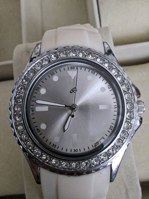 Women's silver-tone watch with crystals used