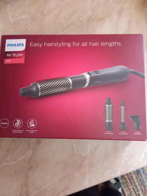 Philips electric hairbrush new with 3 attachments
