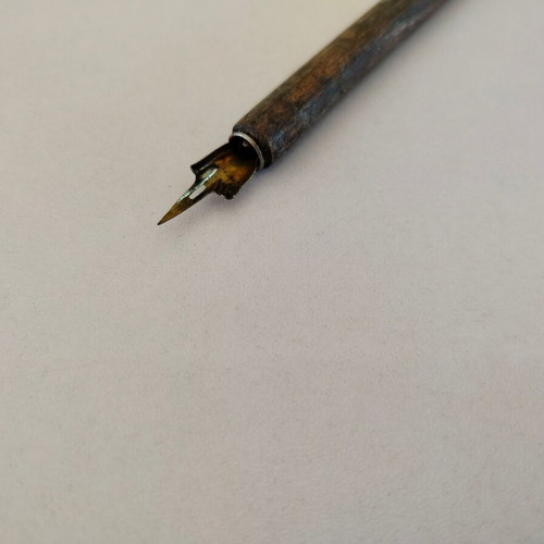 Wooden dip pen used, length 19cm