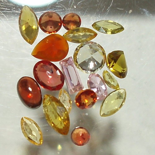 Colored sapphire minerals 19 pieces 8.05 ct various cuts and colors