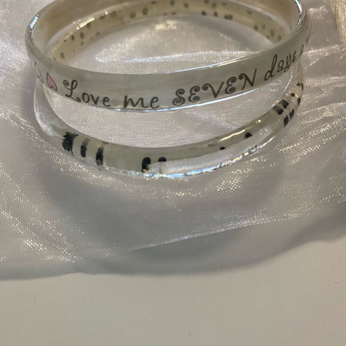 Bracelet set like new, white transparent with designs