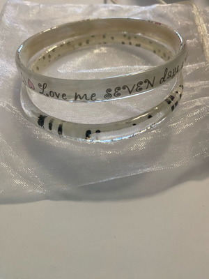 Bracelet set like new, white transparent with designs