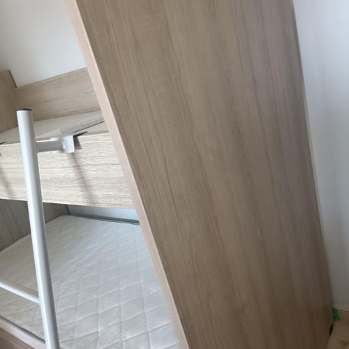 Modeco bunk bed like new, with iron ladder and guardrail