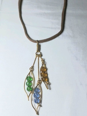 Necklace pendant gold plated with three colored stones and movement on cord new