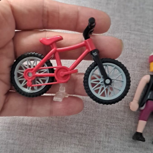 Playmobil woman with bicycle figure
