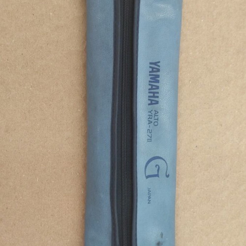 Yamaha flute used with blue leather carrying case and zipper