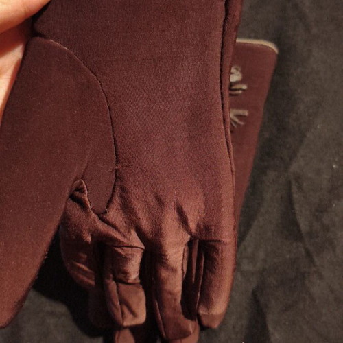 Women's brown gloves used with fleece lining and decorative tassels