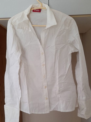 White shirt size approximately XL