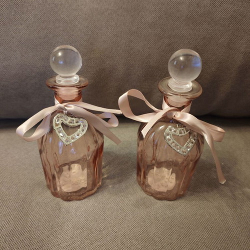 Decorative pink bottles like new, set of two