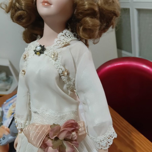 Porcelain doll in excellent condition
