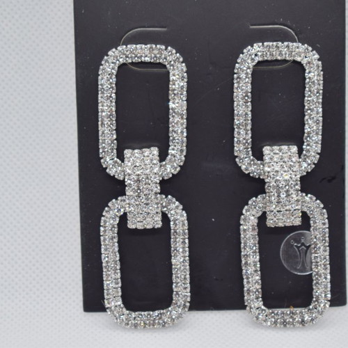 Earrings in silver color with gliter new