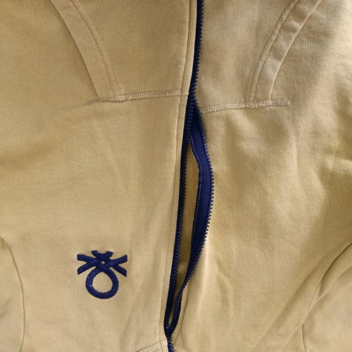 Benetton yellow jacket for 10 years like new