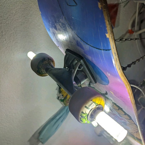 Ceiling light handmade from skateboard used