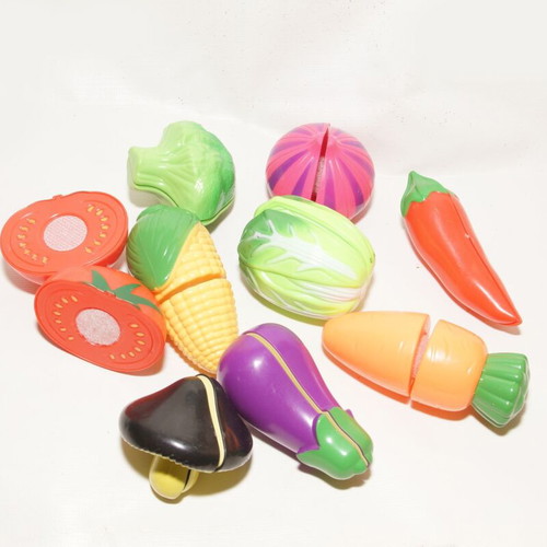 Cutting vegetables and kitchen toys used