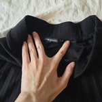 LCW Casual black pleated midi skirt with asymmetrical hem, size S