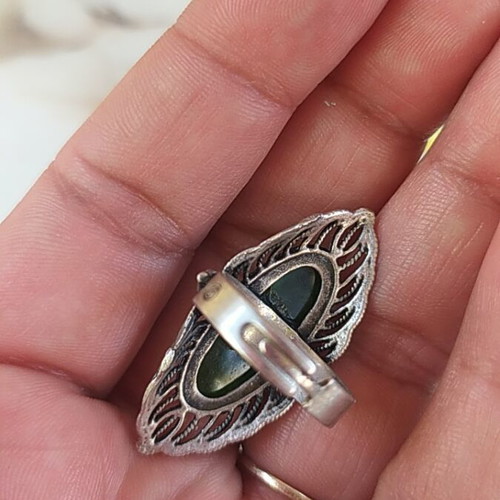 Women's ring new with green stone