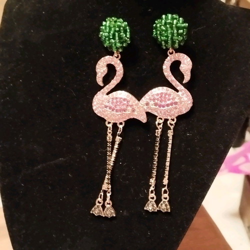 Flamingo stud earrings like new, impressive