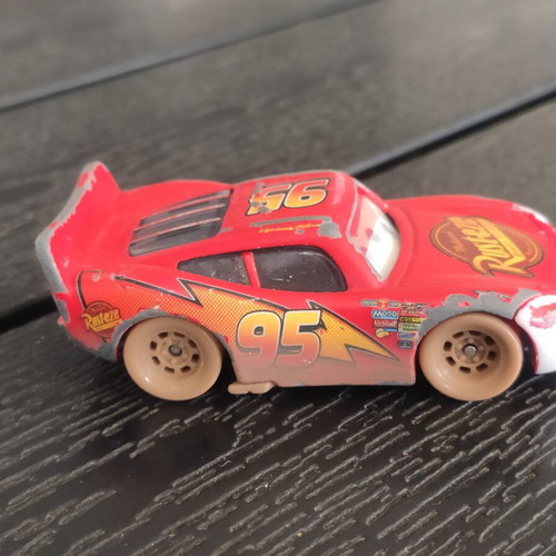 Disney Cars McQueen 1/55 toy car used with 3D eyes in fair condition