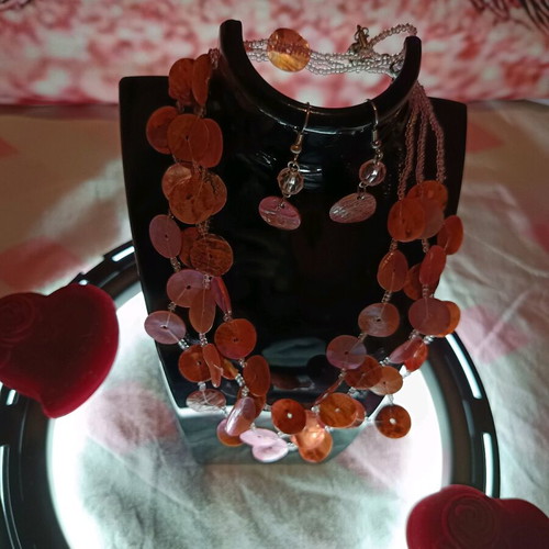 Layered handmade necklace with natural shells and beads