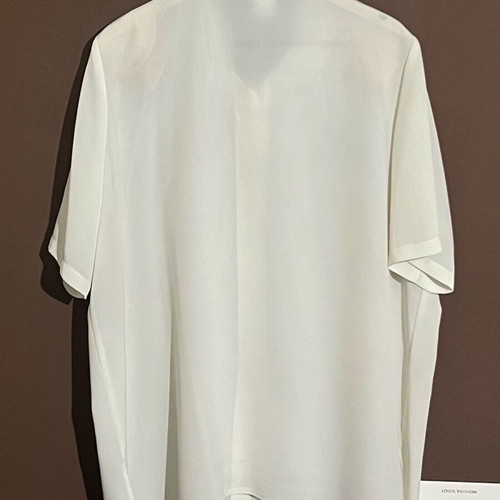 Set of 2 pieces: short sleeve shirt and top size Xlarge, very good condition, creamy white