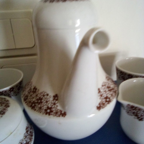 Tea set used with teapot, sugar bowl, creamer and two cups Ionian porcelain
