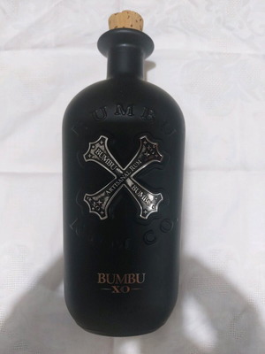 Bumbu XO Rum bottle used, empty
