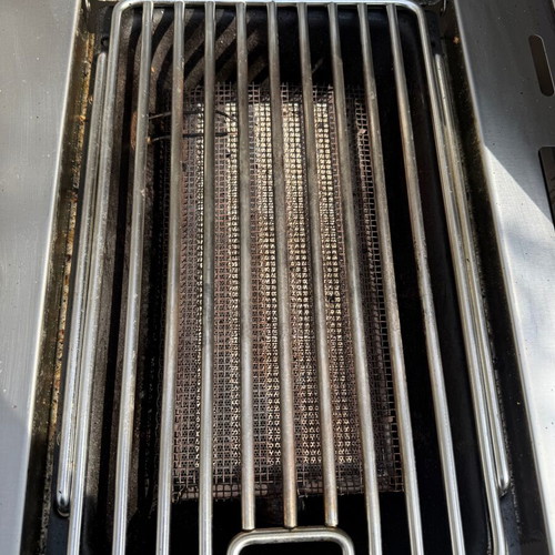 Napoleon Prestige Pro 665 gas grill used with hood and rotisserie