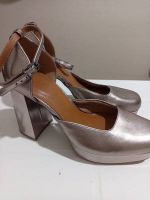 Silver high-heeled pumps new, size 42