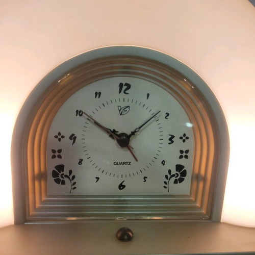Touch clock and lamp that adjusts with touch
