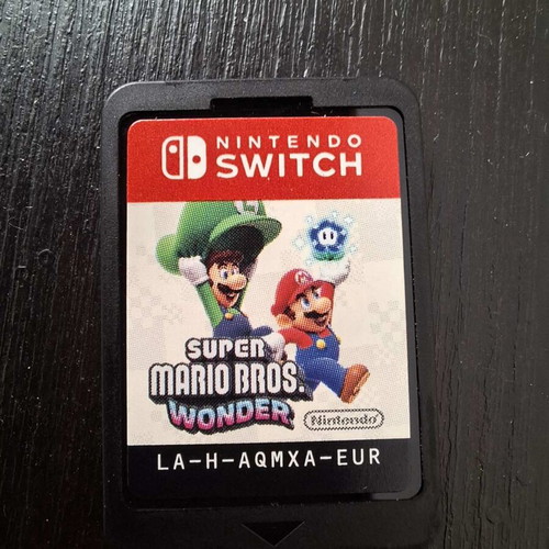 Nintendo Switch like new with original accessories and Super Mario Bros Wonder