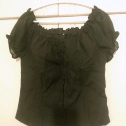 Black top used, size M with off-shoulder design