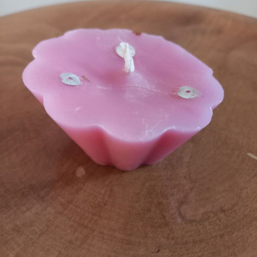 Pink candle like new, flower shape, light rose scent