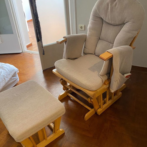 Nursing rocking chair with rocking footrest