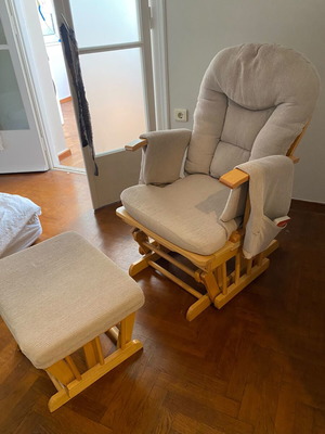 Nursing rocking chair with rocking footrest