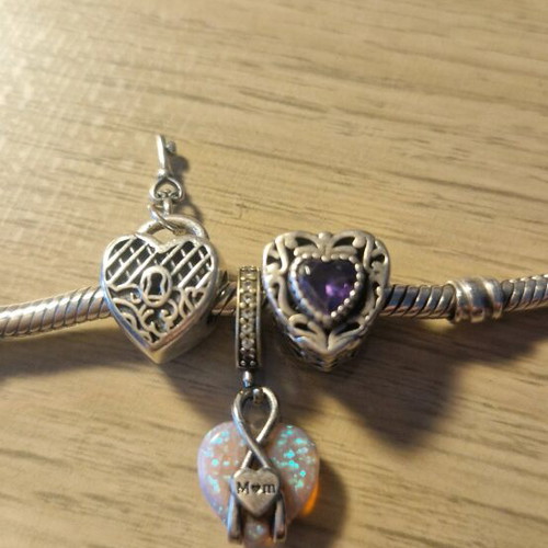 Silver heart with purple stone like new