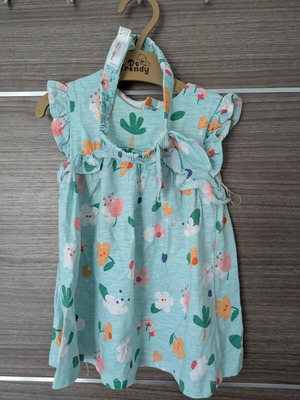 Baby dress with ribbon like new, mint color with floral print