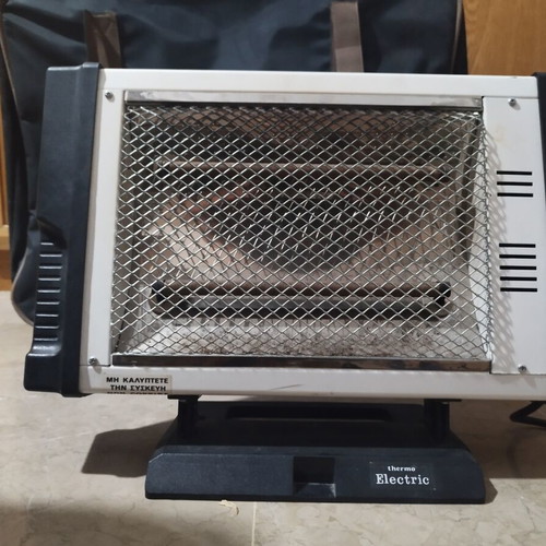 Electric heater like new, 34×47×8 cm