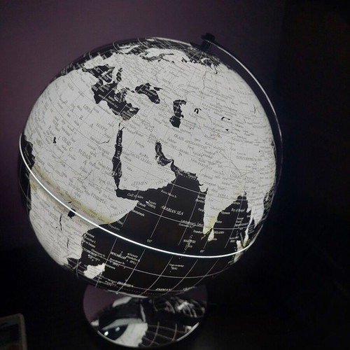 Black and white globe lamp with switch