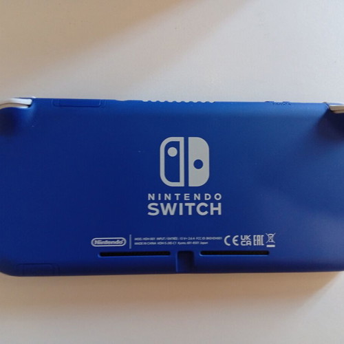 Nintendo Switch Lite like new with accessories, SD card, and game