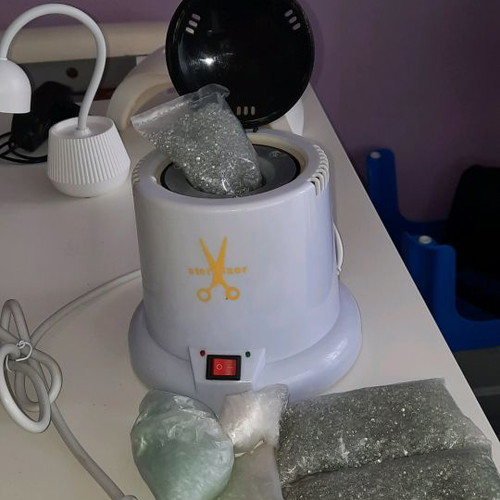 Tool sterilizer with microspheres used