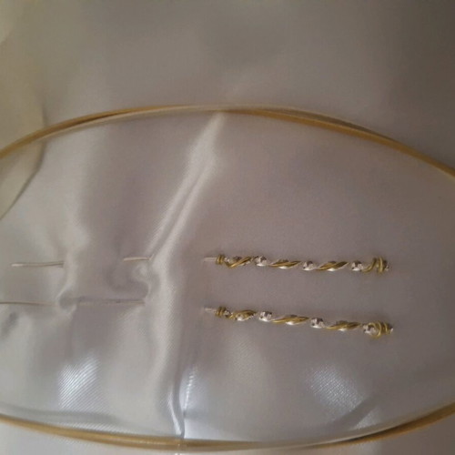 Stefana in yellow and white gold matte color like new with 2 pins
