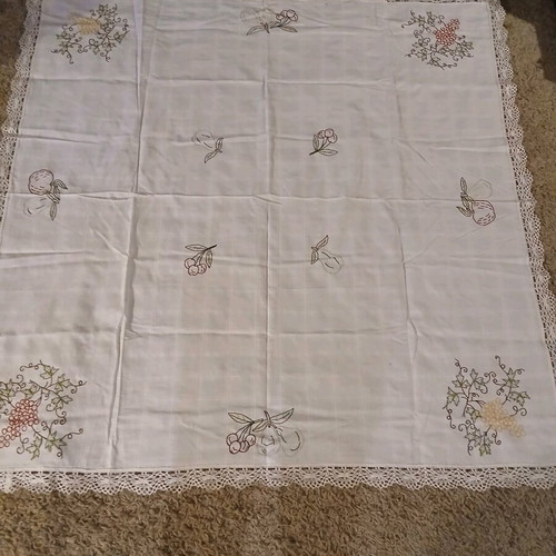 Handmade embroidered tablecloth like new with crocheted lace